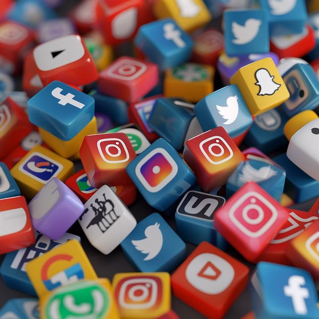 pile colorful blue white dice with facebook logo top 2048x2048 1